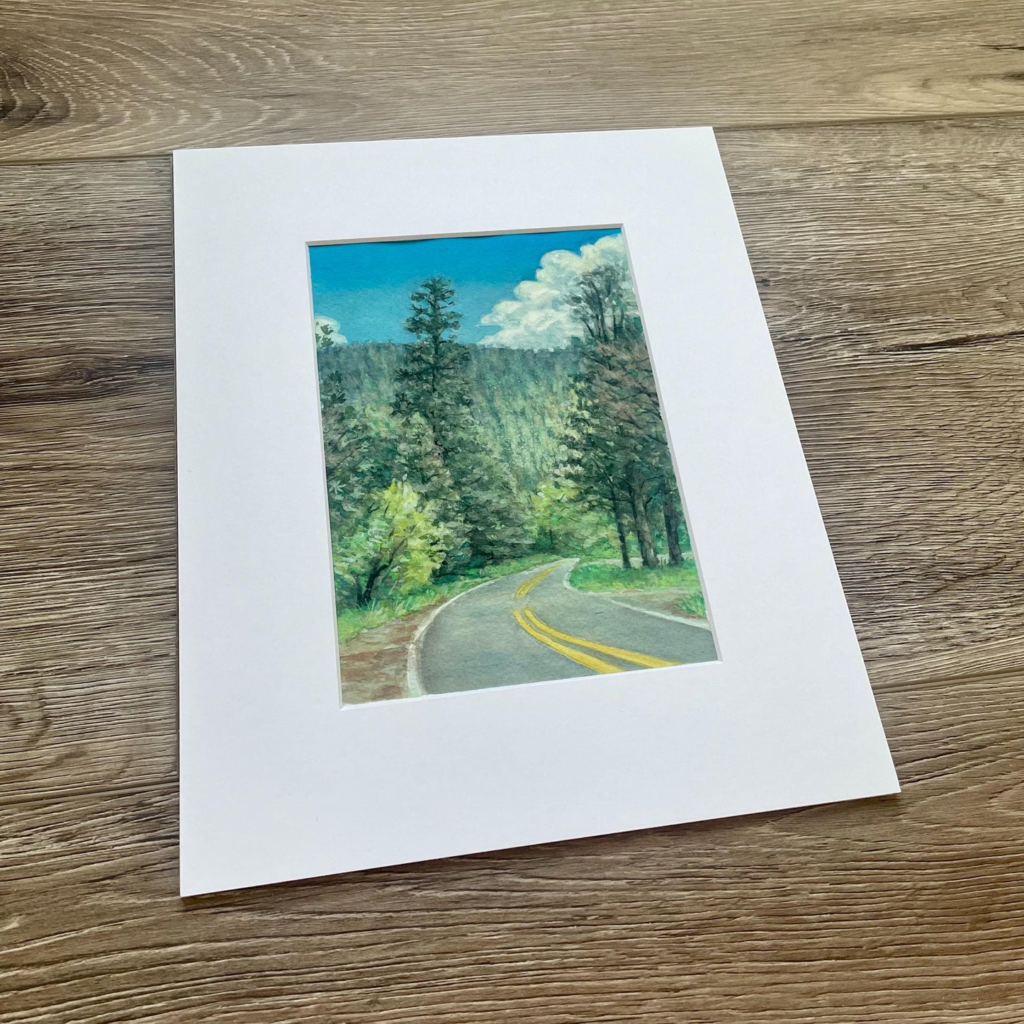 Original watercolor gouache landscape painting of scenic road through the trees and mountains