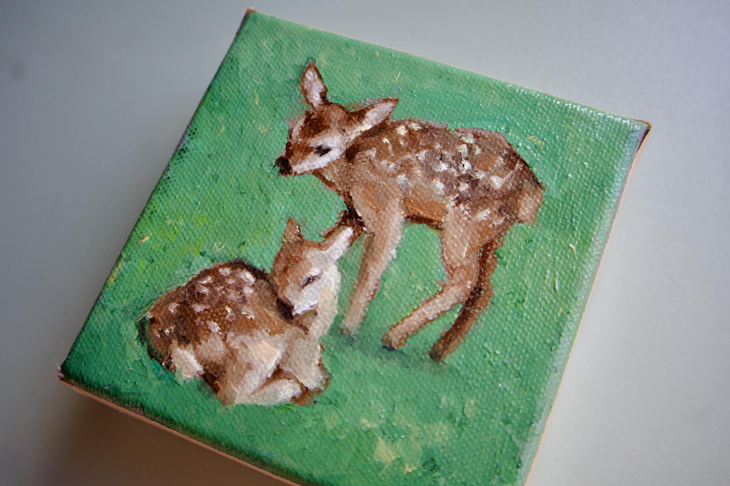 Oil painting of small fawns in grass hand painted artwork baby deer animals small painting art